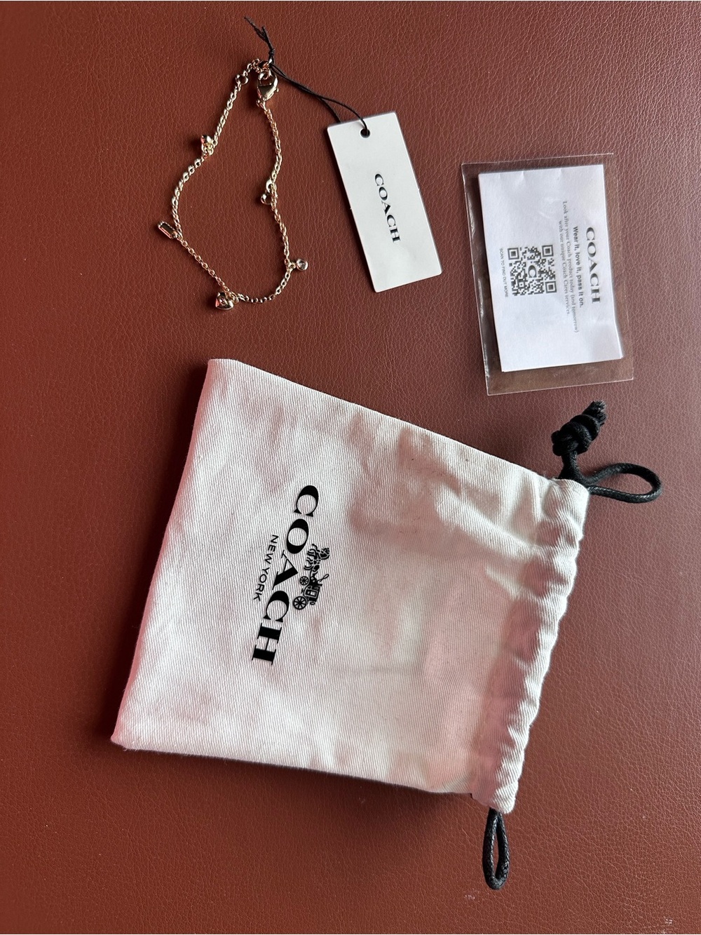 Coach Soft White Drawstring Jewelry Pouch with Black Logo